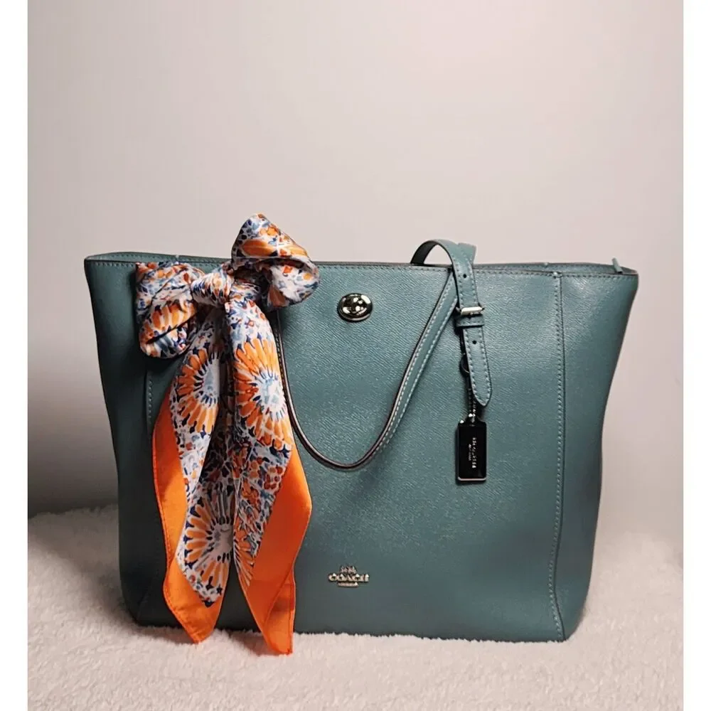 Coach beautiful turnlock